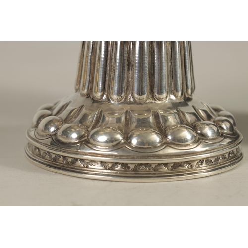 334 - AN EARLY 20TH-CENTURY TUDOR REVIVAL SILVER FOOTED CUP the large oval banded embossed spreading foot ... 