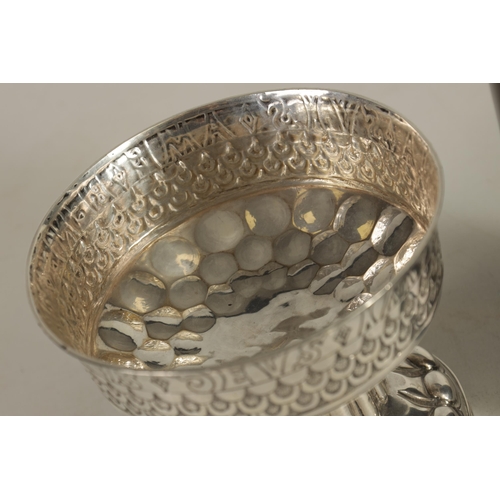 334 - AN EARLY 20TH-CENTURY TUDOR REVIVAL SILVER FOOTED CUP the large oval banded embossed spreading foot ... 