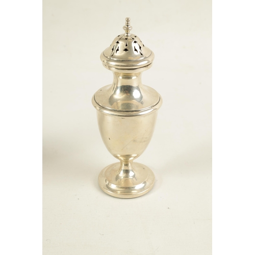 335 - A LARGE 20TH CENTURY SILVER SUGAR SHAKER of plain pedestal baluster form with pierced panelled cover... 