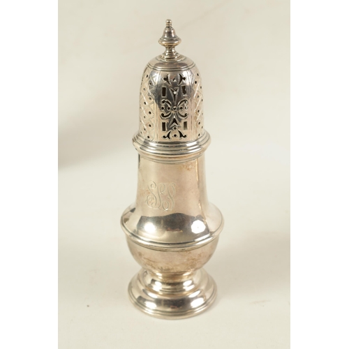 335 - A LARGE 20TH CENTURY SILVER SUGAR SHAKER of plain pedestal baluster form with pierced panelled cover... 