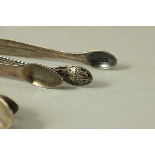 337 - A COLLECTION OF FIVE PAIRS OF GEORGIAN AND VICTORIAN SILVER SUGAR TONGS of varying designs and dates... 