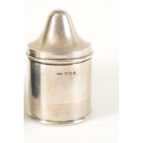 338 - A GEORGE V 'CLARK'S PYRAMID' SILVER CANDLE HOLDER of plain cylindrical form with detachable base and... 