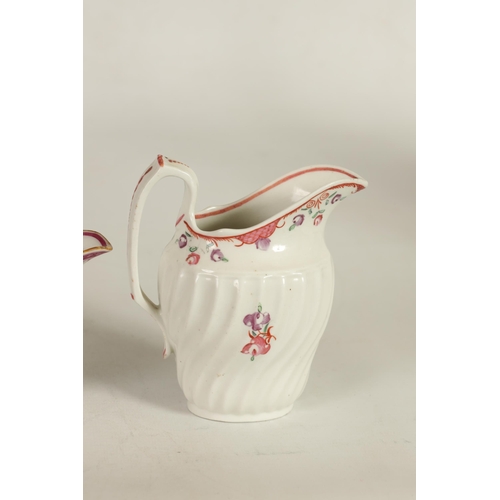 34 - A GROUP OF 18TH CENTURY NEWHALL AND SIMILAR PORCELAIN TEA WARES comprising two creamers, six tea bow... 