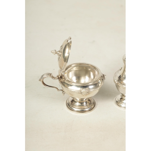 340 - A 1930’S SILVER FIVE PIECE CRUET SET Comprising of two casters, glass lined mustard pot and two cond... 