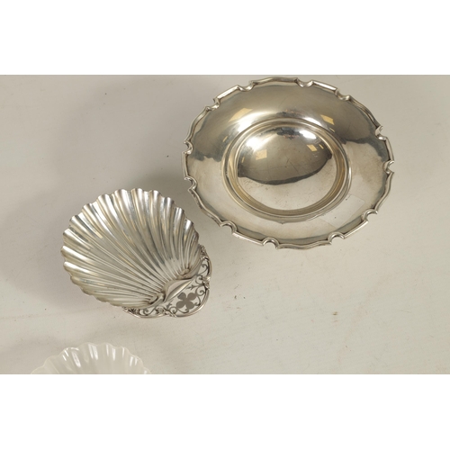 341 - A GEORGE VI SILVER SWEETMEAT DISH of plain pedestal form with dished centre enclosed by a scalloped ... 