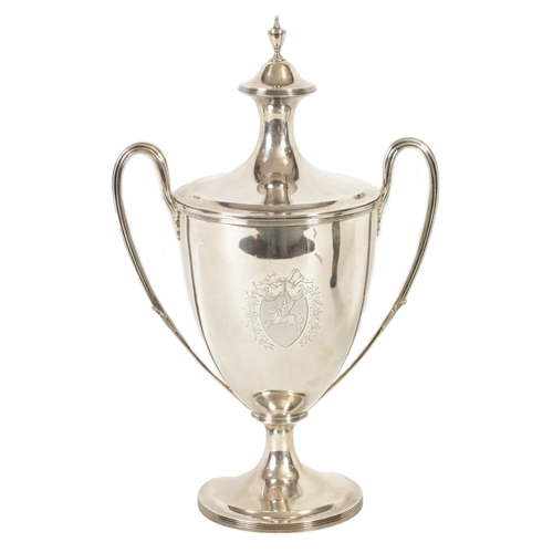 342 - A FINE GEORGE III SILVER TROPHY CUP AND COVER OF LARGE SIZE the urn-shaped body on a ribbed pedestal... 