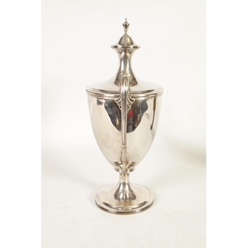 342 - A FINE GEORGE III SILVER TROPHY CUP AND COVER OF LARGE SIZE the urn-shaped body on a ribbed pedestal... 