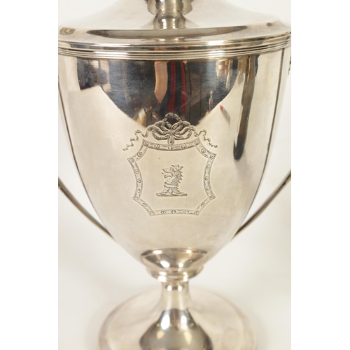 342 - A FINE GEORGE III SILVER TROPHY CUP AND COVER OF LARGE SIZE the urn-shaped body on a ribbed pedestal... 