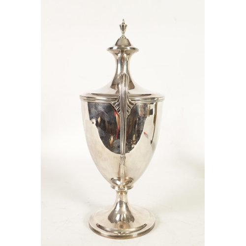 342 - A FINE GEORGE III SILVER TROPHY CUP AND COVER OF LARGE SIZE the urn-shaped body on a ribbed pedestal... 