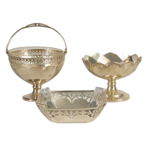 351 - A GEORGE V PEDESTAL SILVER SWEETMEAT BASKET of panelled form with pierced gadroon-edged rim and cut-... 