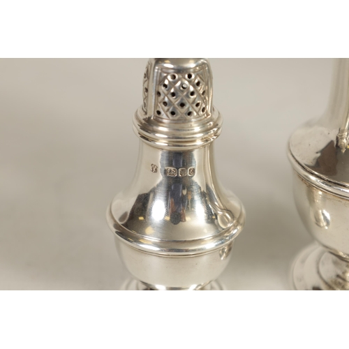 362 - A GEORGE II SILVER SUGAR CASTER AND PAIR OF LATER SILVER PEPPERETTES The Sugar of plain ribbed balus... 