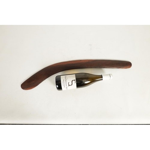 364 - A 19TH CENTURY CHIP CARVED HARDWOOD AUSTRALIAN BOOMERANG with a ribbed upper surface (65.5cm wide)