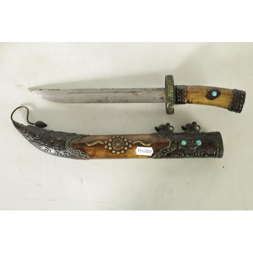 373 - A 19TH CENTURY MONGOLIAN DAGGER the 22cm single-edged fullered steel blade with embossed geometric o... 