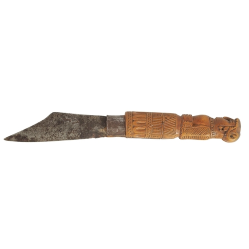 374 - A RARE 17TH CENTURY CARVED FIGURAL FRUITWOOD POCKET KNIFE modelled as a lady with a carved patterned... 