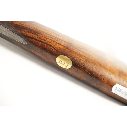 378 - A 19TH CENTURY CASED PIN FIRE DOUBLE BARREL SHOTGUN BY EDWARD LONDON. having damascus barrels and in... 