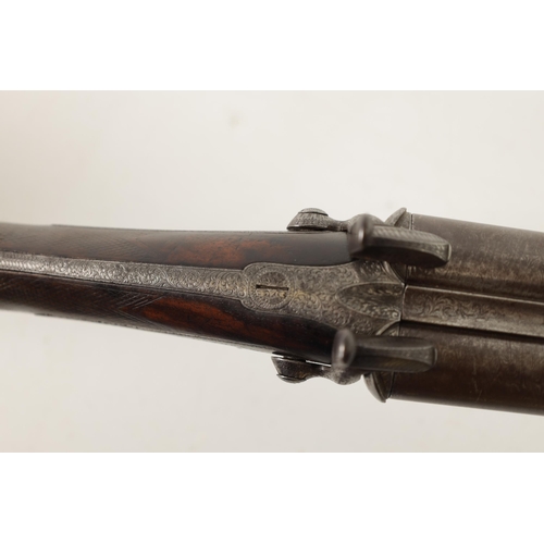 378 - A 19TH CENTURY CASED PIN FIRE DOUBLE BARREL SHOTGUN BY EDWARD LONDON. having damascus barrels and in... 