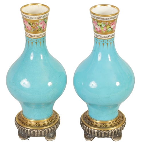 38 - A PAIR OF 19TH CENTURY MINTON AESTHETIC MOVEMENT GILT AND TURQUOISE VASES the bulbous bodies with pi... 