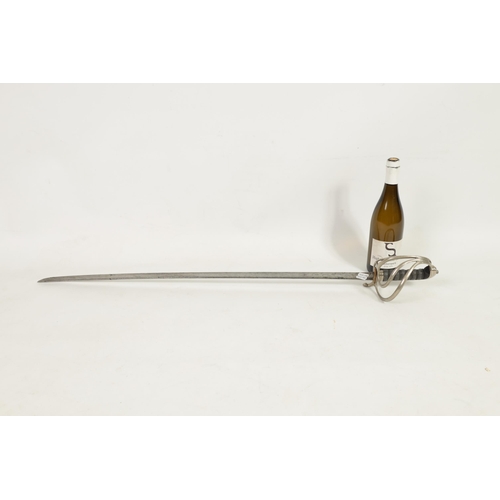 385 - A VICTORIAN ROYAL ARTILLERY OFFICERS SWORD the etched slightly curved blade decorated with crown ove... 