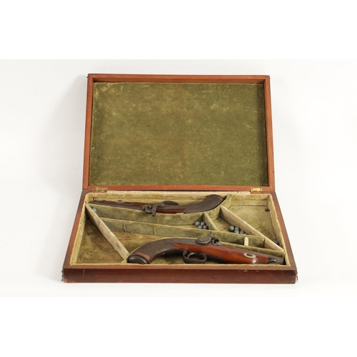 391 - A CASED PAIR OF EARLY 19TH CENTURY PERCUSSION PISTOLS BY MOORE, LONDON. with octagonal sighted barre... 