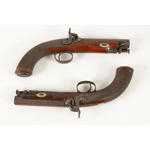 391 - A CASED PAIR OF EARLY 19TH CENTURY PERCUSSION PISTOLS BY MOORE, LONDON. with octagonal sighted barre... 