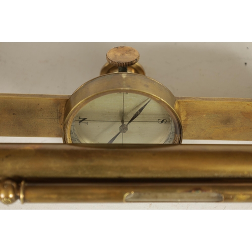 399 - AN EARLY 19TH CENTURY BRASS DRAINAGE LEVEL WITH FITTED COMPASS the long cylindrical brass scope with... 