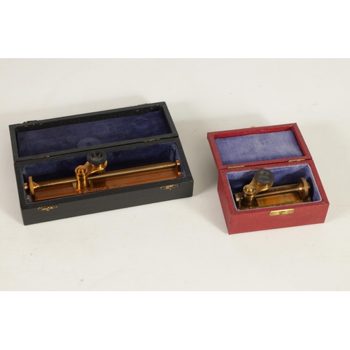 409 - A COLLECTON OF THREE CASED CLOTH COUNTING MICROSCOPES with lacquered brass calibrated stands and rac... 