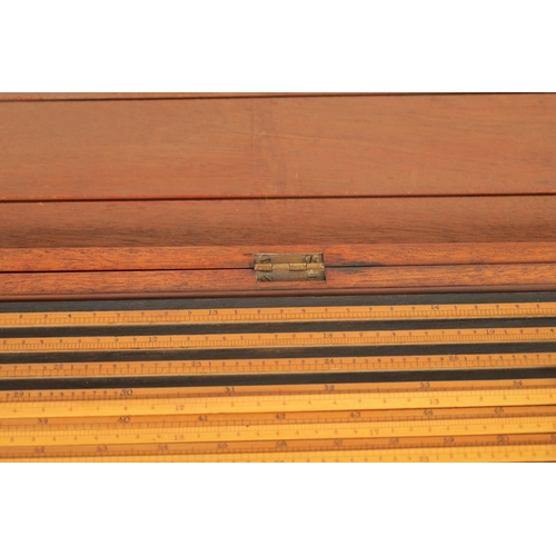 413 - A 19TH CENTURY MAJOR GENERAL HANNYNGTON SLIDE RULE BY ASTON MANDER LTD. LONDON in fitted mahogany ca... 