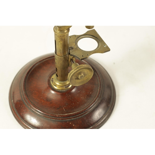 422 - A 19TH CENTURY STUDENTS MOLECULAR MICROSCOPE with turned mahogany weighted base and adjustable top (... 