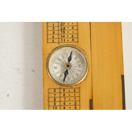 423 - A LEATHER CASED BOXWOOD AND BRASS INCLINOMETER LEVEL with calibrated brass hinge and sights having i... 