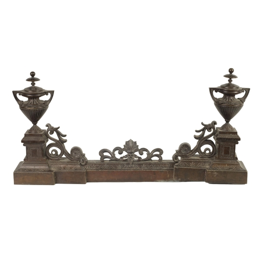 424 - A 19TH CENTURY FRENCH BRONZE ADJUSTABLE HEARTH FENDER with raised urn finials on an engraved shaped ... 