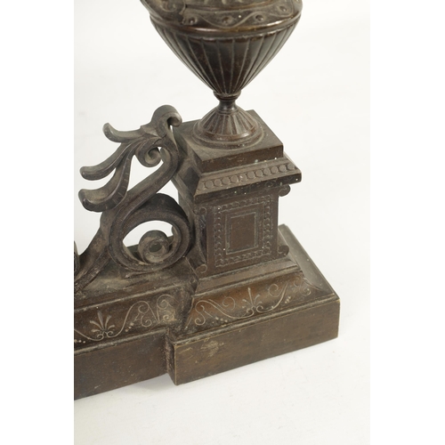 424 - A 19TH CENTURY FRENCH BRONZE ADJUSTABLE HEARTH FENDER with raised urn finials on an engraved shaped ... 