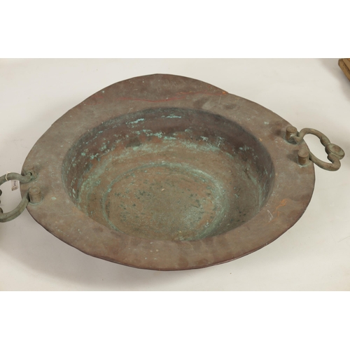 426 - A COLLECTION OF THREE COPPER DISHES comprising a 19th century copper fish kettle lid, a 19th century... 