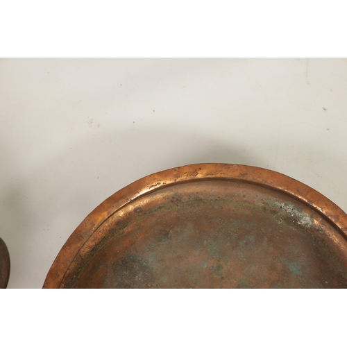 426 - A COLLECTION OF THREE COPPER DISHES comprising a 19th century copper fish kettle lid, a 19th century... 