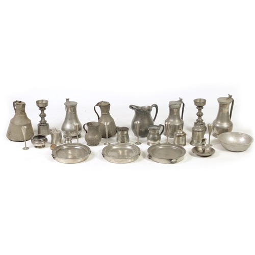 427 - A COLLECTION OF 18TH/19TH CENTURY PEWTER ITEMS including ale jugs, plate warmers, tankards and prick... 