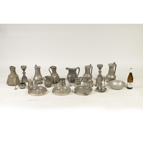 427 - A COLLECTION OF 18TH/19TH CENTURY PEWTER ITEMS including ale jugs, plate warmers, tankards and prick... 