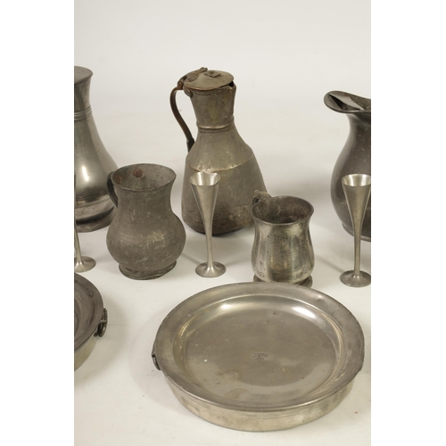 427 - A COLLECTION OF 18TH/19TH CENTURY PEWTER ITEMS including ale jugs, plate warmers, tankards and prick... 