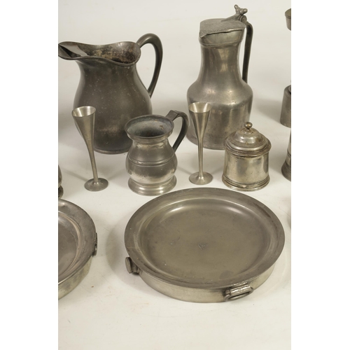 427 - A COLLECTION OF 18TH/19TH CENTURY PEWTER ITEMS including ale jugs, plate warmers, tankards and prick... 