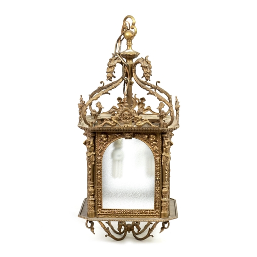 430 - A LATE 19TH CENTURY CAST BRASS HANGING LANTERN the arched glazed sides with mask head and caryatid c... 