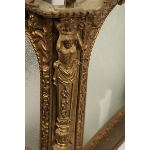 430 - A LATE 19TH CENTURY CAST BRASS HANGING LANTERN the arched glazed sides with mask head and caryatid c... 