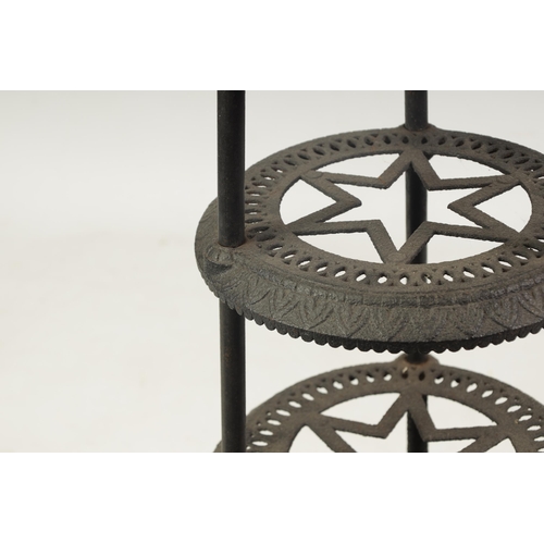 439 - ARCHIBALD KENRICK & SONS, WEST BROMWICH A 19TH CENTURY CAST IRON PAN STAND of eight circular taperin... 