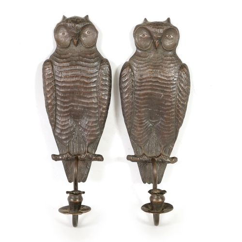 442 - A PAIR OF ARTS AND CRAFTS COPPER WALL LIGHTS FORMED AS OWLS finely detailed with scrolled leaf mould... 