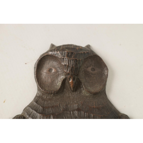 442 - A PAIR OF ARTS AND CRAFTS COPPER WALL LIGHTS FORMED AS OWLS finely detailed with scrolled leaf mould... 