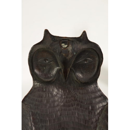 442 - A PAIR OF ARTS AND CRAFTS COPPER WALL LIGHTS FORMED AS OWLS finely detailed with scrolled leaf mould... 