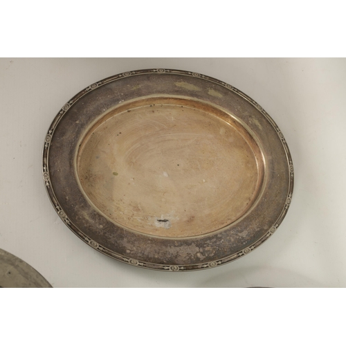 443 - A SELECTION OF 22 18TH AND 19TH CENTURY OVAL AND CIRCULAR PEWTER DISHES/MEAT PLATES comprising a the... 