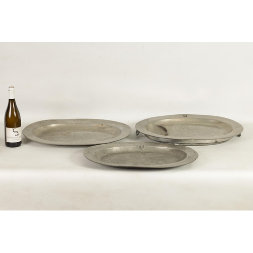 443 - A SELECTION OF 22 18TH AND 19TH CENTURY OVAL AND CIRCULAR PEWTER DISHES/MEAT PLATES comprising a the... 