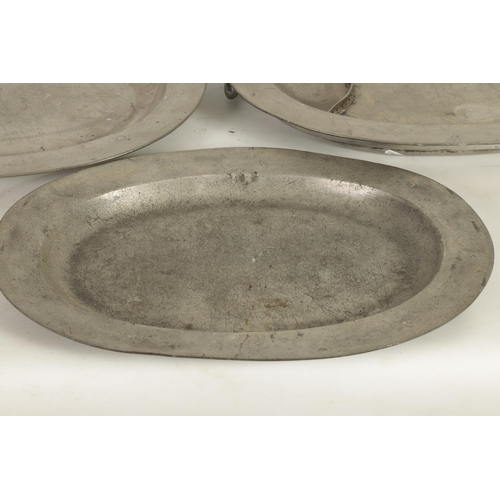 443 - A SELECTION OF 22 18TH AND 19TH CENTURY OVAL AND CIRCULAR PEWTER DISHES/MEAT PLATES comprising a the... 