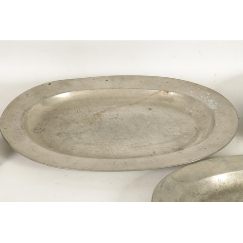 443 - A SELECTION OF 22 18TH AND 19TH CENTURY OVAL AND CIRCULAR PEWTER DISHES/MEAT PLATES comprising a the... 