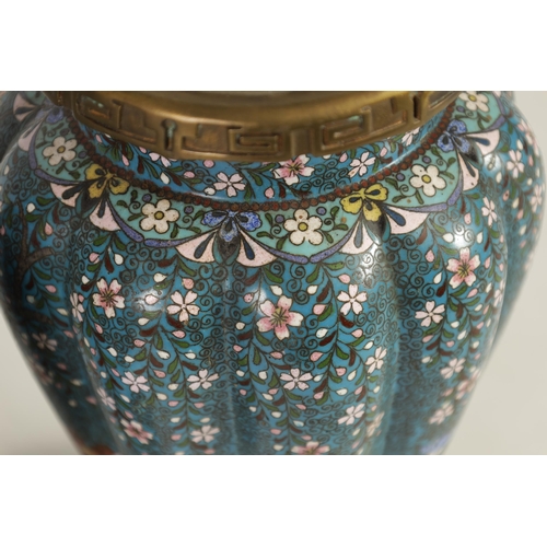 51 - A GOOD PAIR OF 19TH CENTURY JAPANESE CLOISONNÉ ORMOLU MOUNTED LAMP BASES brightly decorated with flo... 