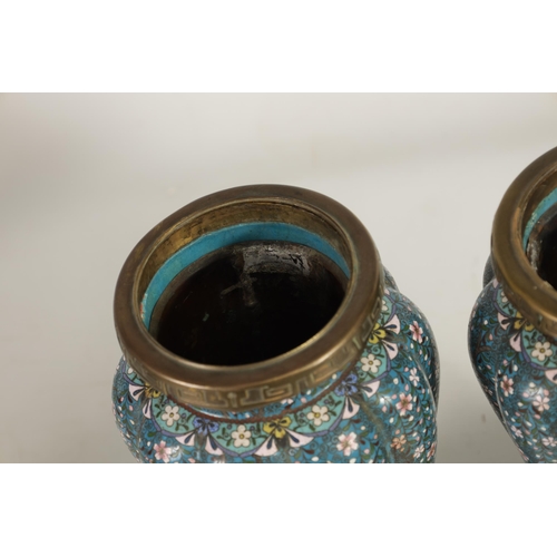 51 - A GOOD PAIR OF 19TH CENTURY JAPANESE CLOISONNÉ ORMOLU MOUNTED LAMP BASES brightly decorated with flo... 