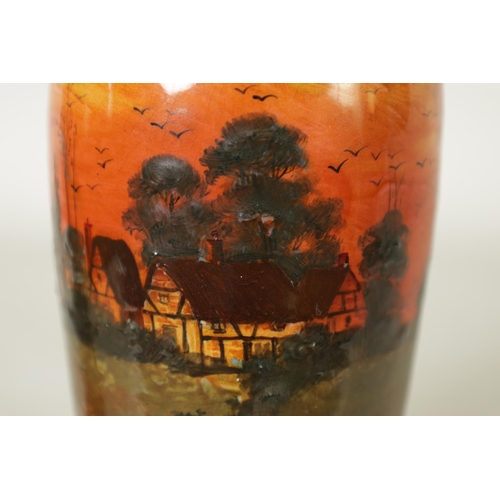 54 - AN EARLY 20TH-CENTURY ROYAL DOULTON SLENDER TAPERING VASE decorated with a raised continuous country... 